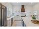 The kitchen features stainless steel appliances and white cabinets at 95 Whitlock Sw Ave, Marietta, GA 30064