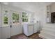 Mudroom with modern washer and dryer with a view of the backyard at 95 Whitlock Sw Ave, Marietta, GA 30064