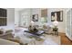 Cozy living room with hardwood floors, comfortable sofa, and stylish decor at 95 Whitlock Sw Ave, Marietta, GA 30064