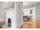 Inviting living room with a fireplace, hardwood floors, and an open view to the kitchen at 95 Whitlock Sw Ave, Marietta, GA 30064
