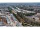 This aerial photo captures the neighborhood's proximity to commercial areas and major roadways at 1212 Lake Point Way, Suwanee, GA 30024
