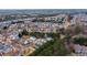 This aerial view highlights the neighborhood's location near a pond and green spaces at 1212 Lake Point Way, Suwanee, GA 30024