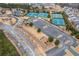 Aerial view of community tennis courts, playground, and parking lot at 1212 Lake Point Way, Suwanee, GA 30024