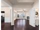 Spacious living room with hardwood floors, fireplace and bright windows at 1212 Lake Point Way, Suwanee, GA 30024