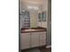 Bathroom featuring a vanity with a mirror and a sink, plus a shower and bathtub for functionality at 1250 Parkwood Cir # 2112, Atlanta, GA 30339