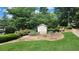 Parkwood Place sign with manicured lawn and landscaping at 1250 Parkwood Cir # 2112, Atlanta, GA 30339