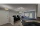 Modern kitchen with a breakfast bar, wood flooring, and an open-concept layout at 1250 Parkwood Cir # 2112, Atlanta, GA 30339