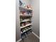 A fully stocked pantry features multiple shelves filled with an assortment of food items at 1250 Parkwood Cir # 2112, Atlanta, GA 30339