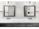 Bathroom vanity with double sinks, modern fixtures, and decorative mirrors at 219 Phillips Ln, Alpharetta, GA 30009