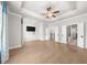 Open Primary bedroom boasts a ceiling fan, recessed lighting, and an en-suite bathroom at 219 Phillips Ln, Alpharetta, GA 30009