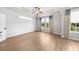 Bedroom featuring neutral paint, custom trim, and abundant natural light at 219 Phillips Ln, Alpharetta, GA 30009