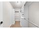 Walk-in closet with custom shelving, drawers, and ample storage for organization at 219 Phillips Ln, Alpharetta, GA 30009