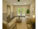 Bright living room with light colored decor and French doors leading to an outdoor deck at 2851 Headland Dr, East Point, GA 30344