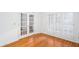 Bright office space with hardwood floors, French doors, and shuttered windows at 5010 Bonnie Way, Roswell, GA 30075