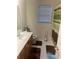 Functional bathroom with a vanity, toilet, and shower, designed for daily convenience and hygiene at 947 Simonton View Ln, Lawrenceville, GA 30045