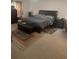 Comfortable bedroom features a queen-sized bed, stylish furniture, and neutral decor for a relaxing retreat at 947 Simonton View Ln, Lawrenceville, GA 30045