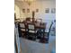 Formal dining room with a marble-top table, seating for six, and elegant decor, perfect for Gathering gatherings at 947 Simonton View Ln, Lawrenceville, GA 30045