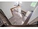 Open living room with high ceilings, fireplace, wood floors, and large windows at 103 Caracas Dr, Woodstock, GA 30188