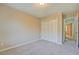 Bedroom featuring neutral walls, plush carpeting and natural light at 126 Usher Ln, Covington, GA 30016