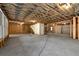 Unfinished basement ready for customization with exposed beams, stud walls, and concrete floor at 320 Dodd Ln, Alpharetta, GA 30005