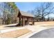 Charming covered gazebo by the roadside providing shade and a rest stop, enhancing community appeal at 320 Dodd Ln, Alpharetta, GA 30005