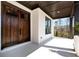 Inviting front porch with stylish double doors and ample space for seating at 320 Dodd Ln, Alpharetta, GA 30005