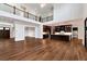 The spacious living room has hardwood floors, a great view of the open kitchen and a high ceiling at 320 Dodd Ln, Alpharetta, GA 30005
