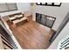 A grand view of the living room with hardwood floors, a fireplace, and open concept kitchen at 320 Dodd Ln, Alpharetta, GA 30005