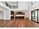 Open concept living space combines the living room, dining area, and kitchen for seamless entertaining at 320 Dodd Ln, Alpharetta, GA 30005