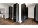 Stylish walk-in closet with built-in shelving, drawers, and ample storage space for an organized wardrobe at 320 Dodd Ln, Alpharetta, GA 30005