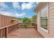 Inviting wooden back deck with a privacy fence, garden, and view of the backyard at 5000 Davenport Pl, Roswell, GA 30075