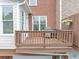 Inviting wooden back deck with a stainless steel grill, and a connection to the house at 5000 Davenport Pl, Roswell, GA 30075