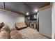 Finished basement with a plush carpet, comfortable seating, and media area at 5000 Davenport Pl, Roswell, GA 30075