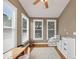 Bright bonus room with hardwood floors, neutral walls, three windows, and a comfortable atmosphere for any activity at 5000 Davenport Pl, Roswell, GA 30075