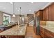 Lovely kitchen featuring granite countertops, stainless steel appliances, and hardwood floors at 5000 Davenport Pl, Roswell, GA 30075