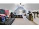 Spacious bedroom with vaulted ceilings, offering ample room for relaxation and decor at 1721 Mcgarity Rd, Temple, GA 30179