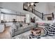 Bright and open living space with cozy seating area and adjacent modern kitchen at 1721 Mcgarity Rd, Temple, GA 30179