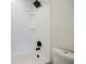 Bathroom shower and tub with white subway tile at 180 Oliver Dr, Locust Grove, GA 30248