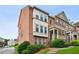 Brick townhome with beautiful landscaping and steps leading to front entrance at 2149 Shoop Se Ct # 3, Smyrna, GA 30080