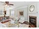 Bright living room and dining area featuring fireplace, and hardwood floors at 2149 Shoop Se Ct # 3, Smyrna, GA 30080
