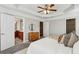 Main bedroom featuring a trey ceiling and ensuite bathroom, as well as access to a walk-in closet at 2149 Shoop Se Ct # 3, Smyrna, GA 30080