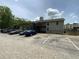 Apartment building featuring ample parking space in the front, with lush green trees in the background at 607 Park Ridge Cir, Marietta, GA 30068