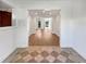 Open-concept living room with hardwood floors, leading to more living space, and a smooth transition at 607 Park Ridge Cir, Marietta, GA 30068