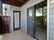 Private outdoor patio featuring sliding glass doors and a privacy fence at 607 Park Ridge Cir, Marietta, GA 30068