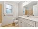 Well-maintained bathroom with updated vanity and classic tiling at 745 Greenvine Pl, Roswell, GA 30076
