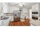 Bright kitchen featuring stainless steel appliances, granite countertops, and ample cabinet space at 745 Greenvine Pl, Roswell, GA 30076