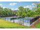 Community pickleball courts featuring professional surfaces and shady trees at 745 Greenvine Pl, Roswell, GA 30076
