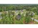 This aerial view highlights the home’s location, nestled in a serene neighborhood with mature trees at 130 W Pier Way, Fayetteville, GA 30214