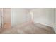 Neutral bedroom with carpeted floors and walk-in closet, perfect for relaxation and storage at 130 W Pier Way, Fayetteville, GA 30214
