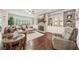 Inviting living room featuring hardwood floors, built-in shelving, and a cozy fireplace at 130 W Pier Way, Fayetteville, GA 30214